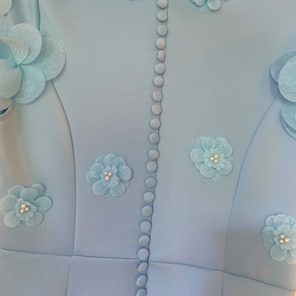 Very cute fitting dress stretch material  looks great on.size 2